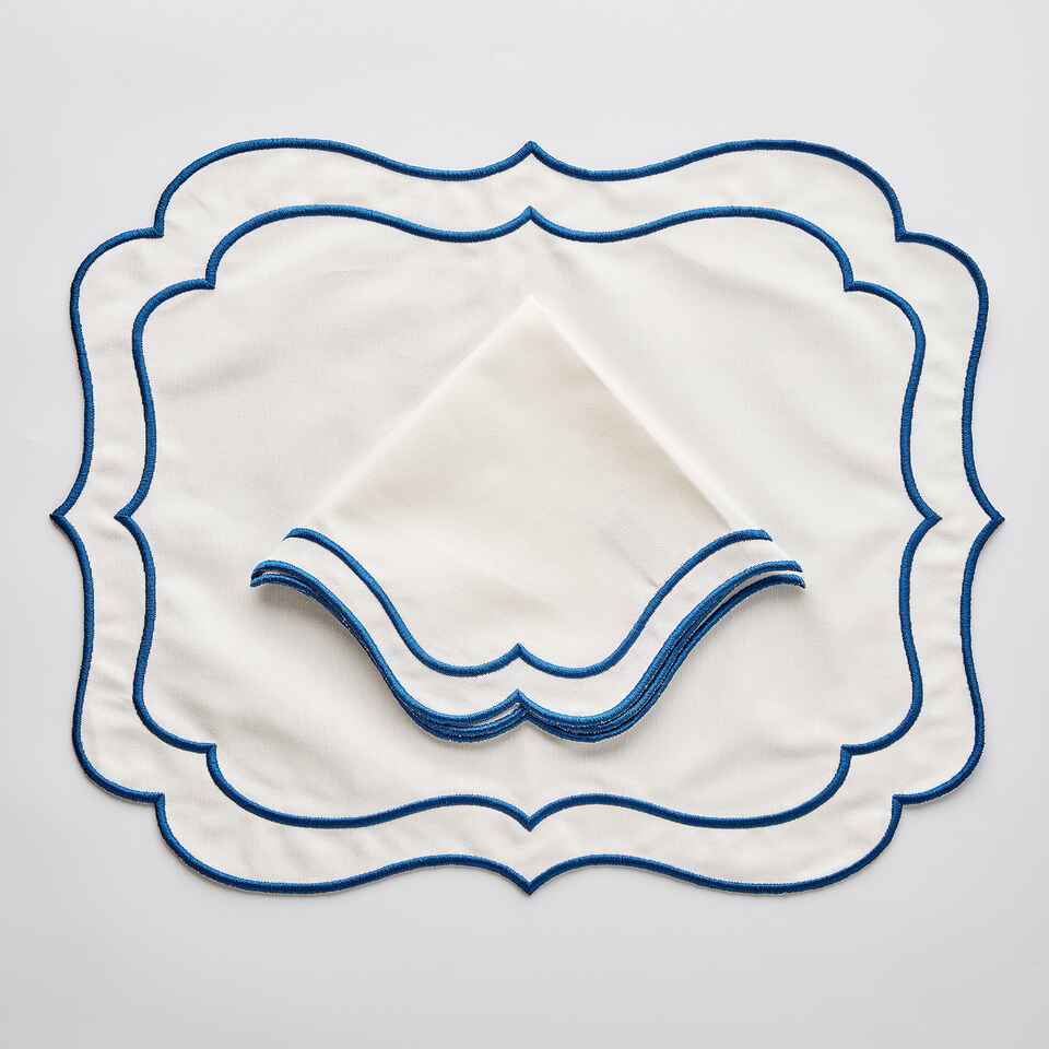 מפית Aurora עם שוליים כחול כהה - פיית השולחן